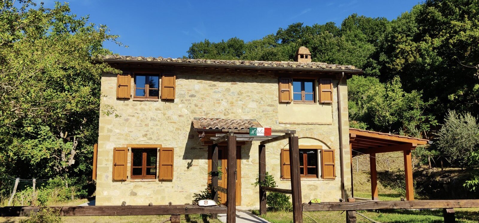 Il Palazzino, a private stone country house surrounded by wooded hills in northern Umbria